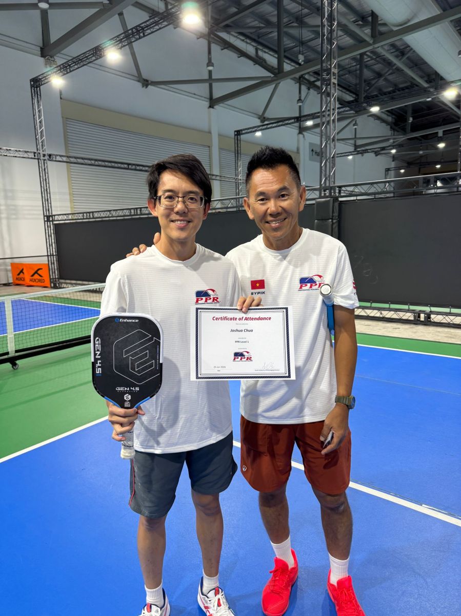 Coach Gary Tan on an outdoor pickleball court in Singapore